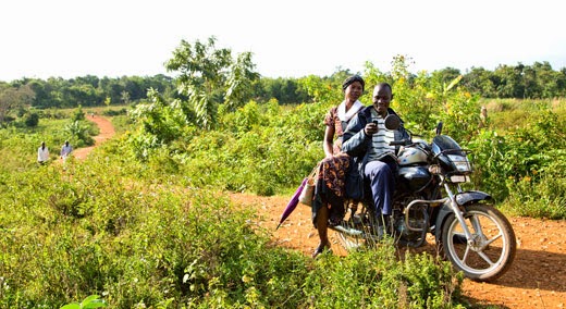 Man and woman sitting on a motorcycle